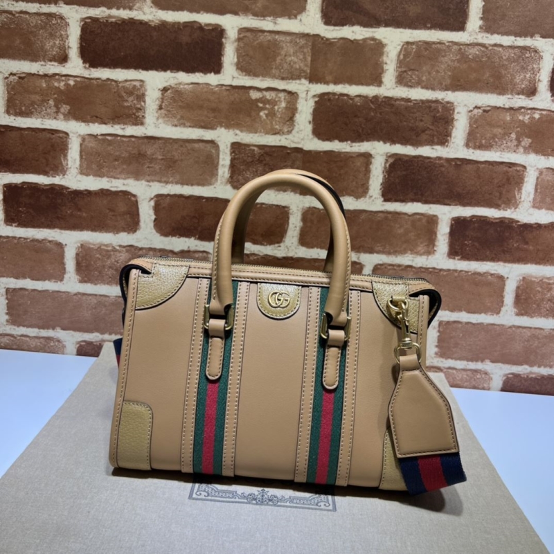 G*u*i top handle bags